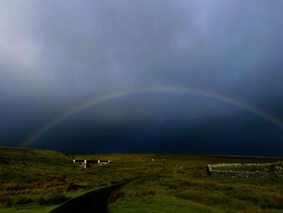 And looking back as we returned, a weak rainbow