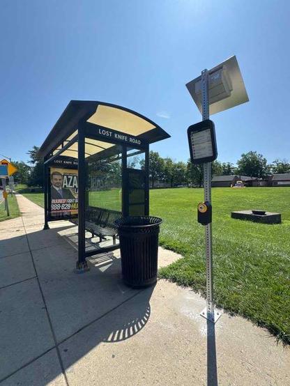 picture of the new e-reader device at a ride on bus stop