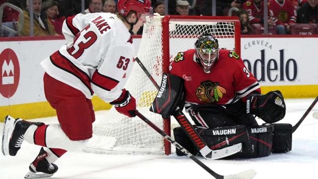 Aho scores in overtime as the Hurricanes beat the Blackhawks 4-3