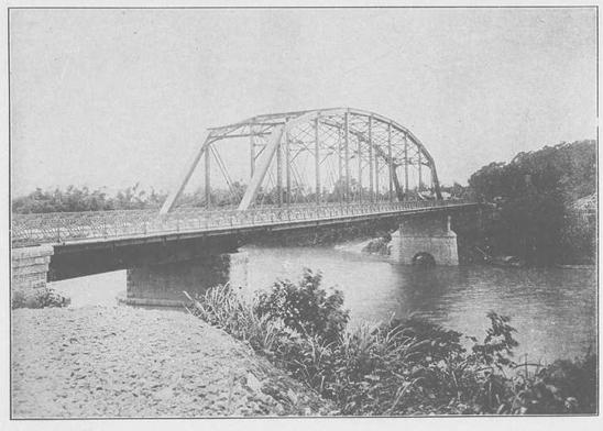 The original steel truss Meiji Bridge.