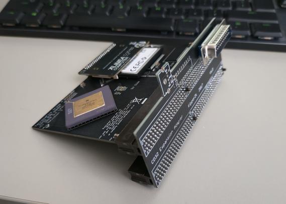Terrible Fire 330 expansion card for Amiga CD32 in Expansion Adapter, with IDE to CF card adapter and Compact Flash card inserted