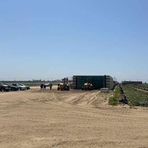 temporary structure to store the potatoes workers harvest.