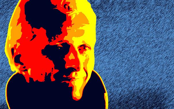 Rutger Hauer as Roy Batty in Blade Runner. Just his head is visible, He is smiling.