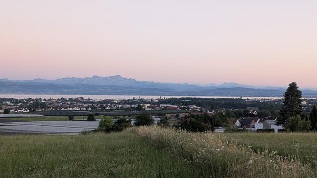 Great view with lake constance in lake foreground anc swiss alps in the background,