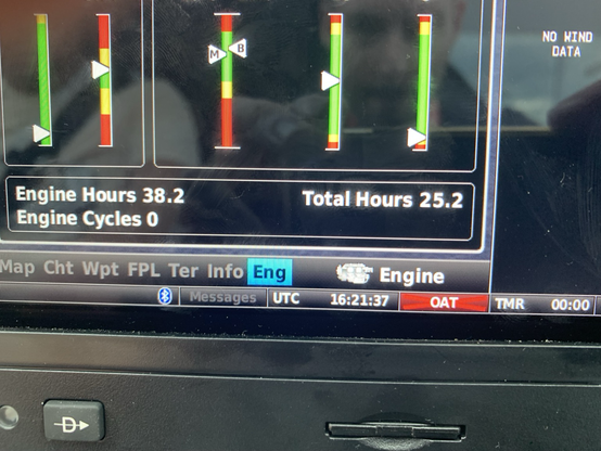 A MFD showing the engine Page which says 25.2 hours.