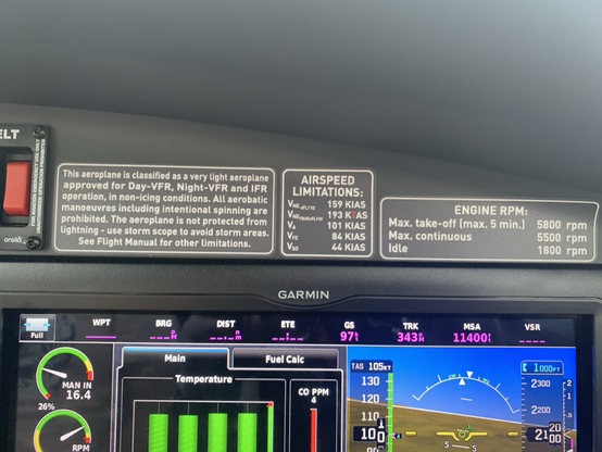 Cockpit dashboard with hints about airspeed limitations and power settings.