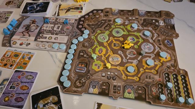 My machine and tribe board at the end of a 2 player game of Revive