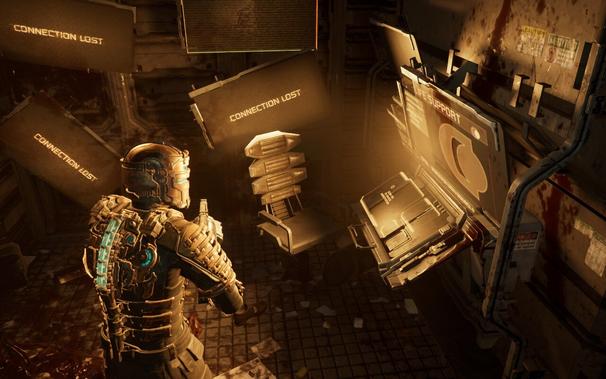 Isaac stands at a computer workstation surrounded by monitors reading CONNECTION LOST