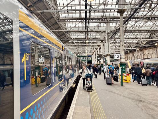 Train arrived at a busy platform