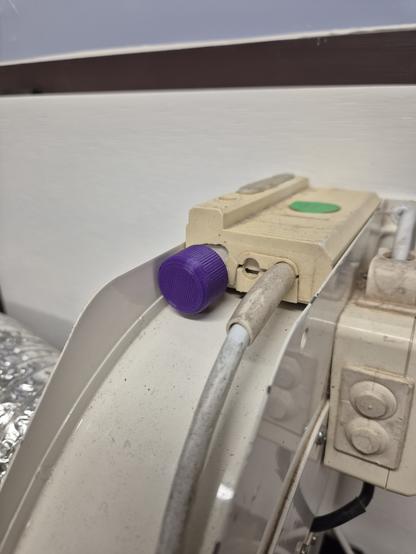 Top of extraction fan with 3D printed adjustment knob