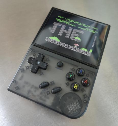 muOS on black Anbernic RG58XX Plus showing The Great Giana Sisters running on the Commodore 64 emulator.