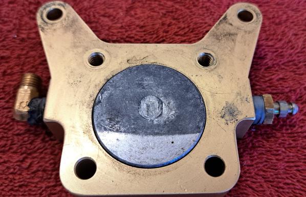 The brake piston before disassembly.
