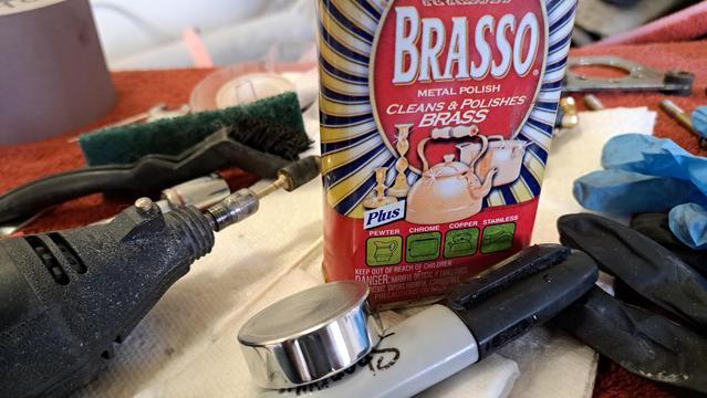 Aluminum is soft. (And this is a small area to work on...small job.) It wet sands easily, and polishes fast.

Now I'm ready to put the piston back together.