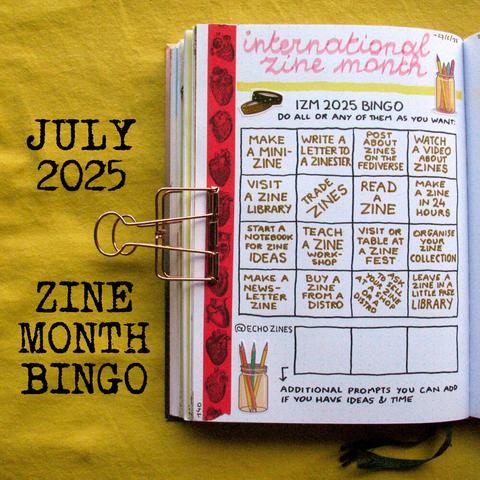 Bullet journal opened to reveal a page with a bingo design with each box filled with a zine-themed prompt. Text: July 2025, zine month bingo.