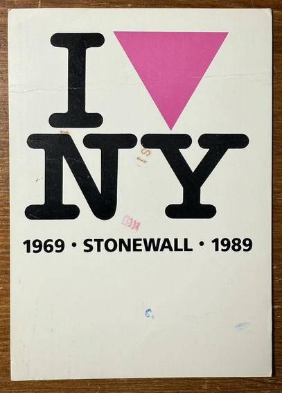 Postcard just has text and instead of the heart it has a pink triangle in the I love New York.