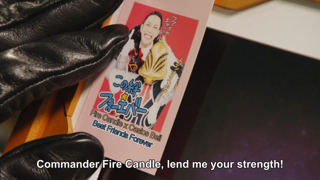 Cassios Beia stroking a photo of himself with Fire Candle, photo has "Best Friends Forever" on it.