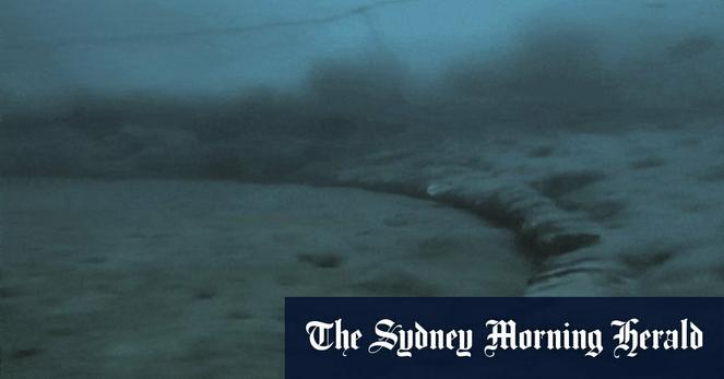 The Sydney Morning Herald cover picture of a chain being dragged across the ocean bottom to net all the sea life, leaving behind a cloud of sediment.