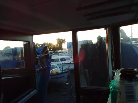 View to northwest from wheelhouse as the sun dips behind trees