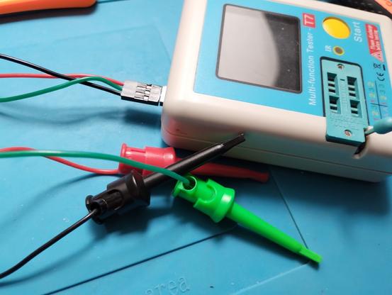 the component tester with test clips attached to the new socket