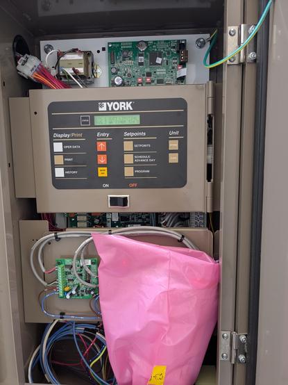 the control panel of a York chiller. it's gravy colored