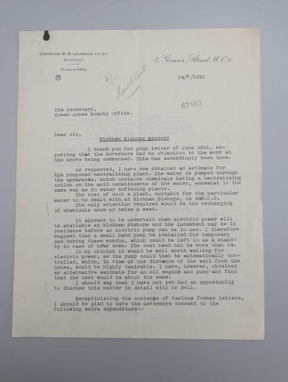 Cream coloured paper with typewriter text. Circular paperclip of tarnished metal positioned at upper right corner.