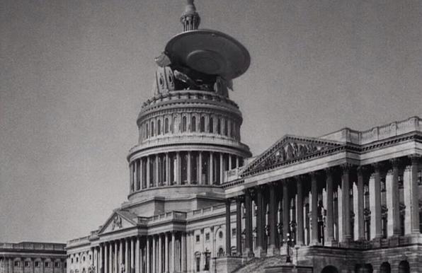 A flying saucer from Earth vs. the Flying Saucers (1956), firmly cantilevered into the U. S. Capitol.