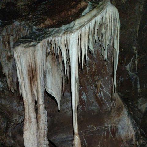 A curtain of white dripstone