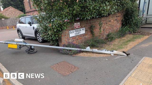 a knocked down speed camera pole