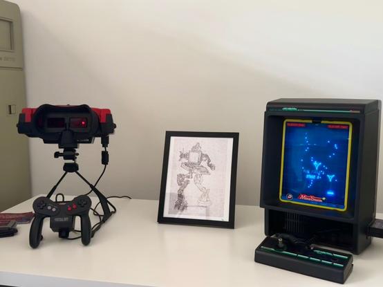 A Nintendo virtual boy and a Bandai vectrex