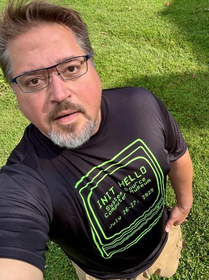 Man in an Init Hello t-shirt