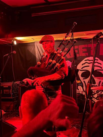 Bagpiper on stage