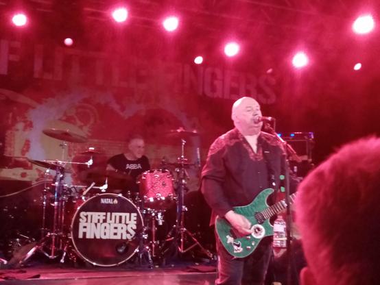 Stiff Little Fingers on stage at the Tramsheds