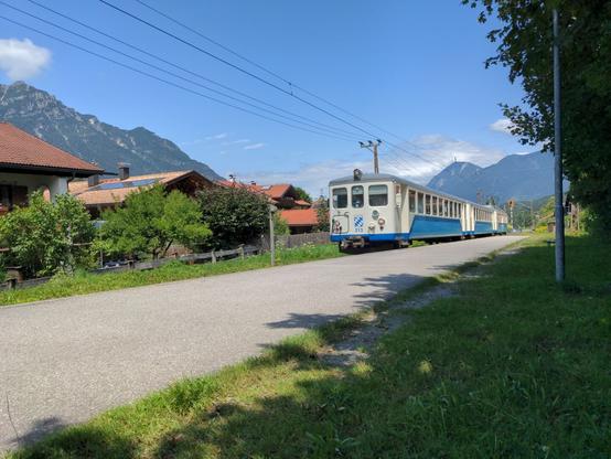 Blue-beige control car 213 of Bayrische Zugspitzbahn on its way to the Eibsee at Hammersbach stop.