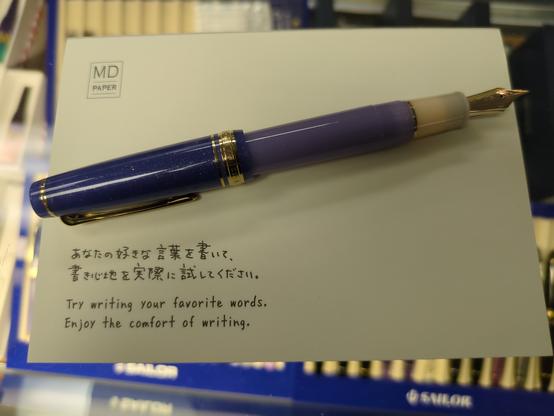 The pen posted on a Midori pad
