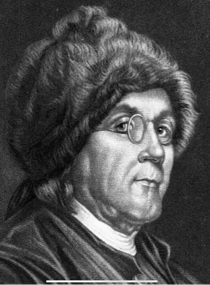 This is a black and white engraving of Benjamin Franklin. He is wearing a fur hat and has spectacles on. His expression is serious.