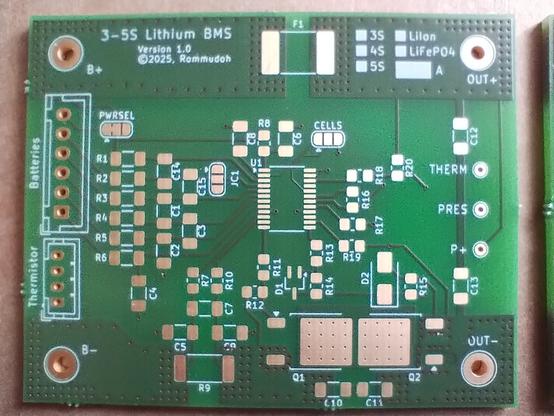 front of my BMS board. it has connections for the battery at the left and outputs to the right. the solder pads have a nice ENIG finish.