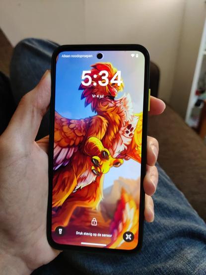 The front of the phone. It shows my gryphon character as the background.