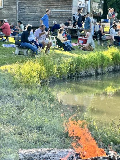Essex Farm. People talking. Flames visible.