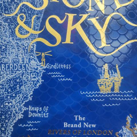 close up of Stone and Sky's front cover, showing a coastal map of Aberdeen, with an oil rig visible offshore