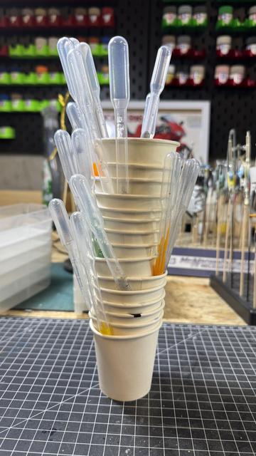 Stacked paint mixing cups