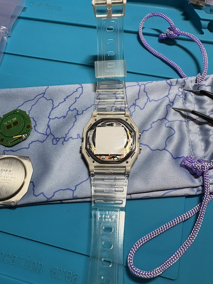 Fully installed Sensor Watch Pro in a F-91W before the back case is installed. The original F-91W circuit board is to the left.