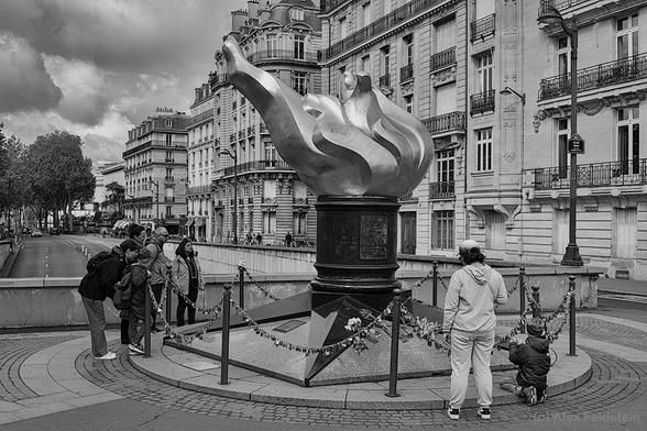 Freedom Torch
Paris

Flowers placed there because it is on top of the tunnel where Princess Diana died. 

In B&W
