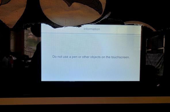 Printer display screen now reads "Do not use a pen or other objects on the touchscreen".