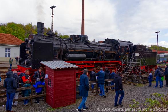 A photo of a steam locomotive, the P1 with the number 38 2267, waiting for passengers to board.