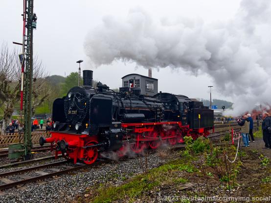 A photo of a driving steam locomotive, the P1, with the number 38 2267.