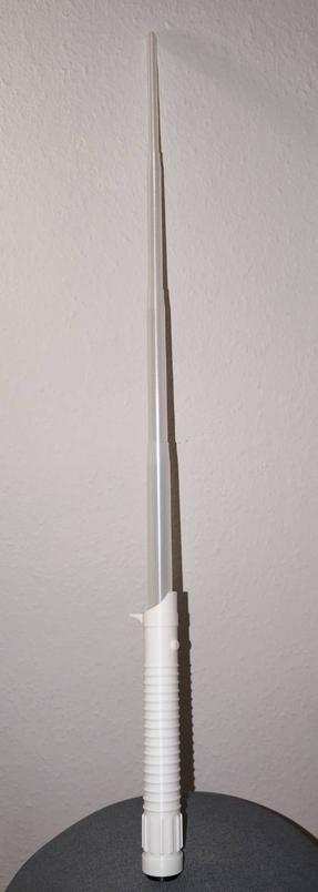 A photo of the 3D-printed light saber with a white hilt and a transparent blade. Illumination still missing.