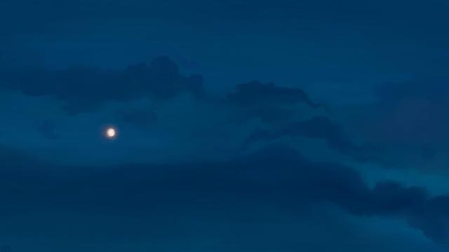 Digital painting of a night sky, a dark shade of blue, with darker blue clouds framing a yellow gibbous moon. The clouds are solid, but a little wispy still.