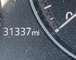 odometer displaying 31337 mi