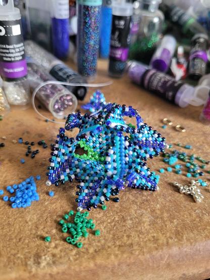 Flower of Unknown Origin No.001: A beaded iris-form flower made of 11/0 Delica beads.