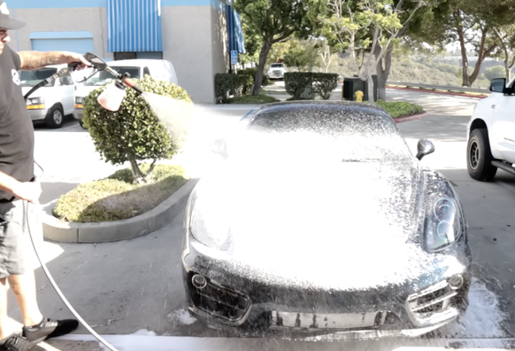 Random youtube guy spraying foam all over his car